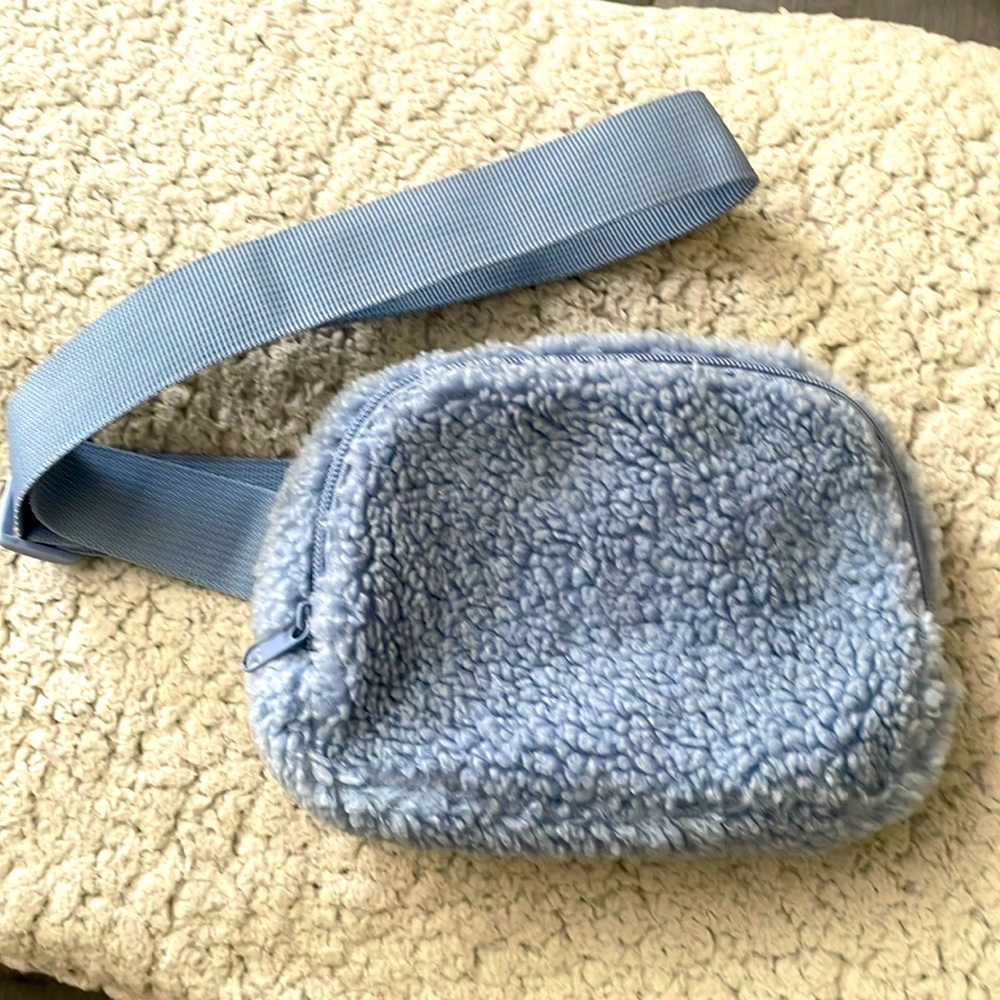 Blue hip fanny pack.